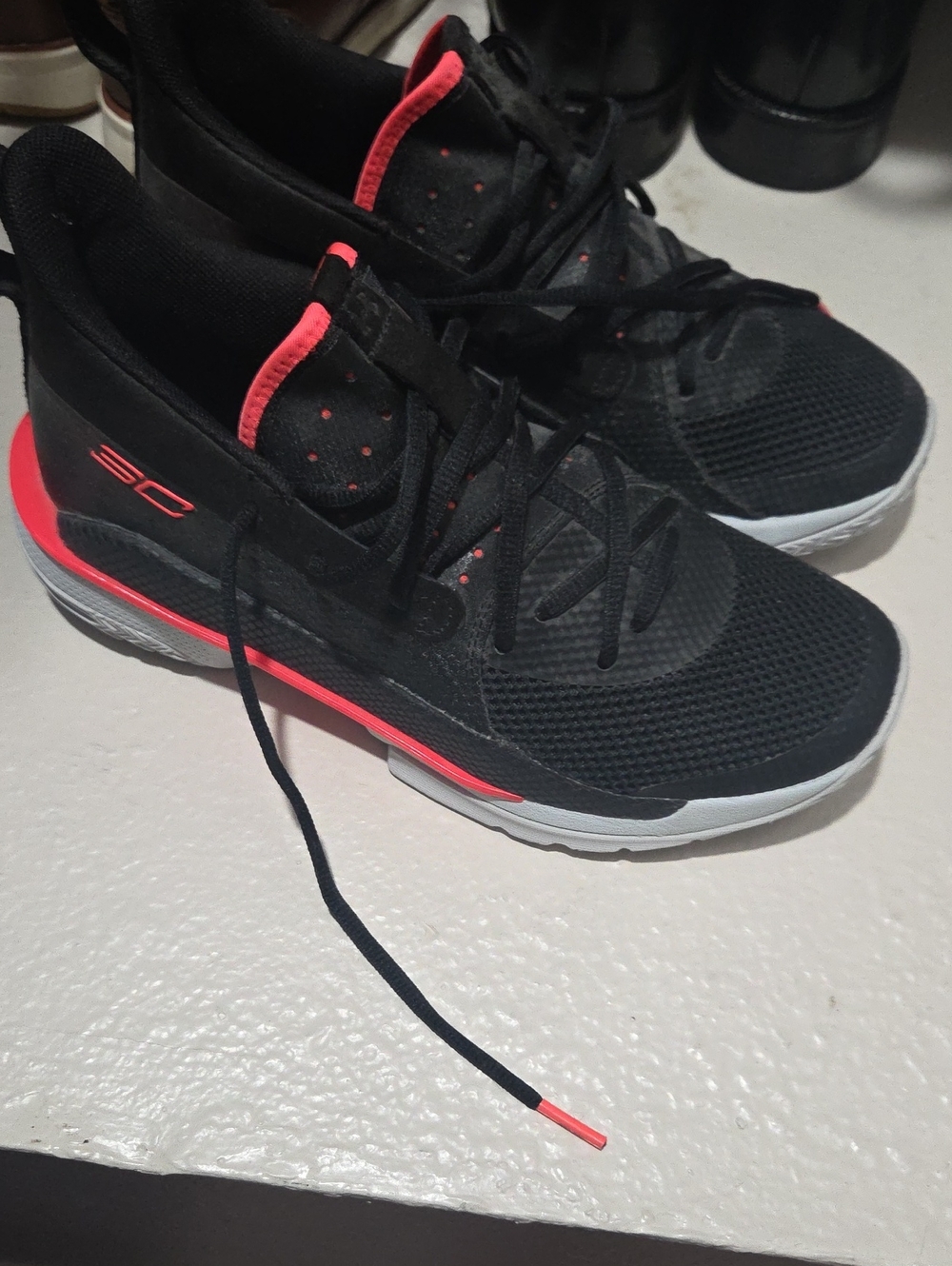 Under Armour Black Athletic Shoes with Coral Accents